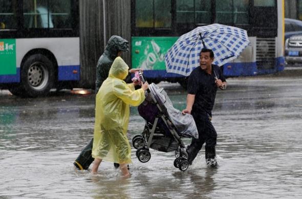 تصاویر : جاری شدن سیل در پکن