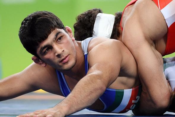 تصاویر : سومین طلای المپیک ایران با شاهکار یزدانی