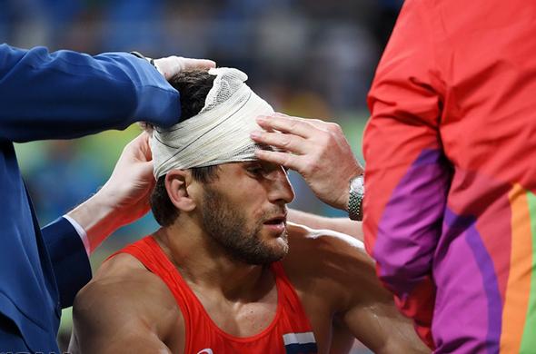 تصاویر : سومین طلای المپیک ایران با شاهکار یزدانی