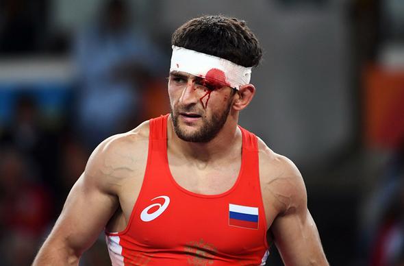 تصاویر : سومین طلای المپیک ایران با شاهکار یزدانی