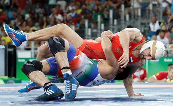 تصاویر : سومین طلای المپیک ایران با شاهکار یزدانی