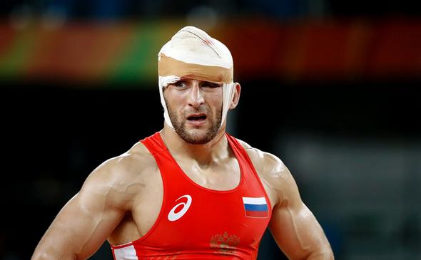 تصاویر : سومین طلای المپیک ایران با شاهکار یزدانی