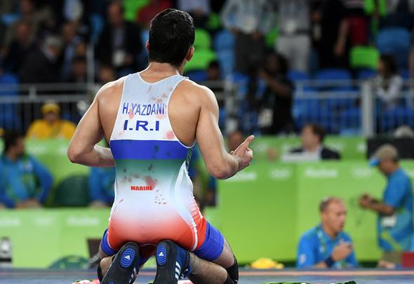 تصاویر : سومین طلای المپیک ایران با شاهکار یزدانی