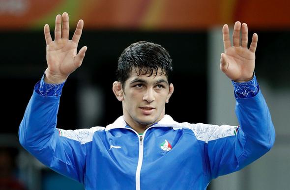 تصاویر : سومین طلای المپیک ایران با شاهکار یزدانی