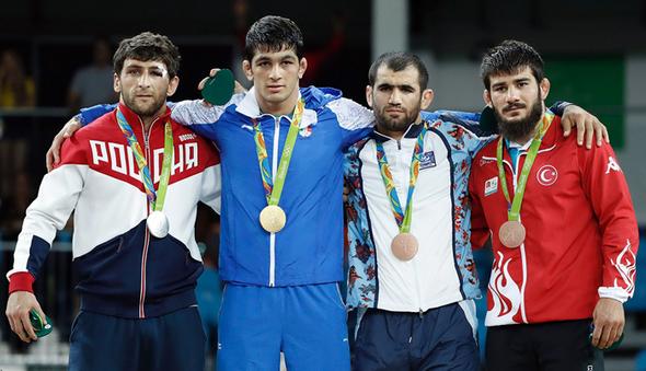 تصاویر : سومین طلای المپیک ایران با شاهکار یزدانی