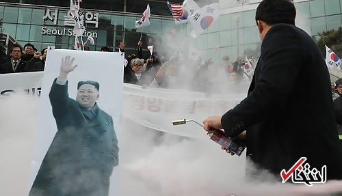 معترضان تصویر رهبر و پرچم کره شمالی را در سئول آتش زدند