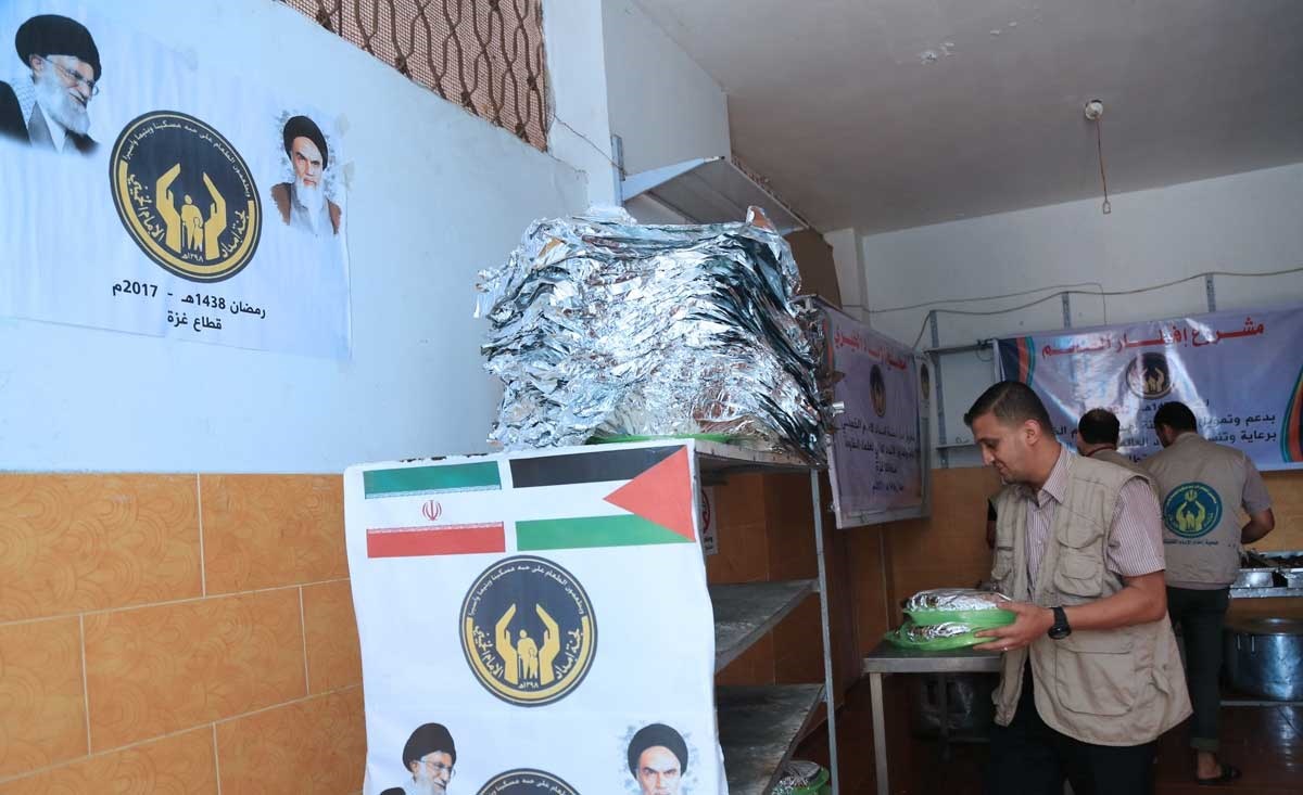 تصاویر : توزیع بسته‌های افطار برای رزمندگان غزه