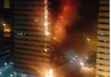 مهار آتش سوزی در برج 20 طبقه در غرب تهران/عکس