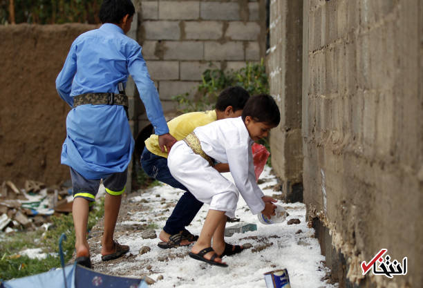 عکس/ خوشحالی کودکان یمن از بارش بی‌سابقه تگرگ