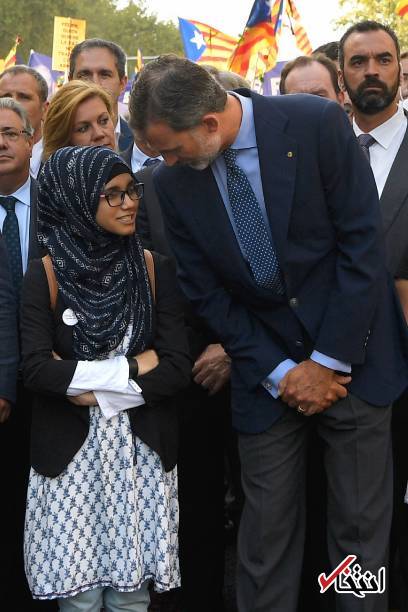 عکس/ دختر مسلمان کنار پادشاه اسپانیا در راهپیمایی ضد داعش