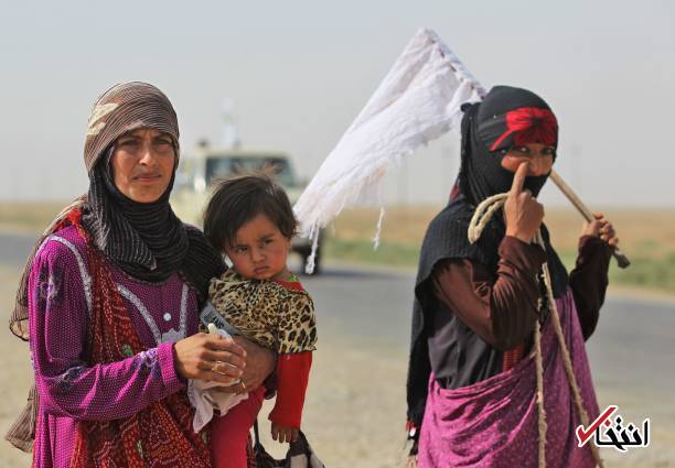 تصاویر : فرار یک خانواده از دست داعش با پرچم سفید
