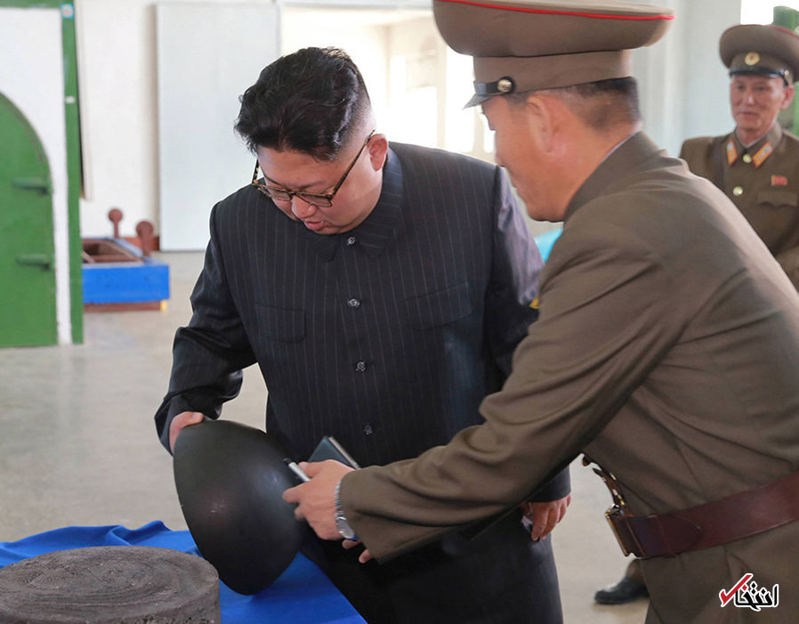 تصاویر :  رونمایی کیم جونگ اون از طرح موشکی جدید کره شمالی