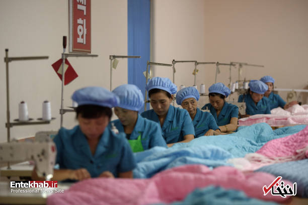 عکس/ زنان شاغل در کارخانه نساجی در کره شمالی