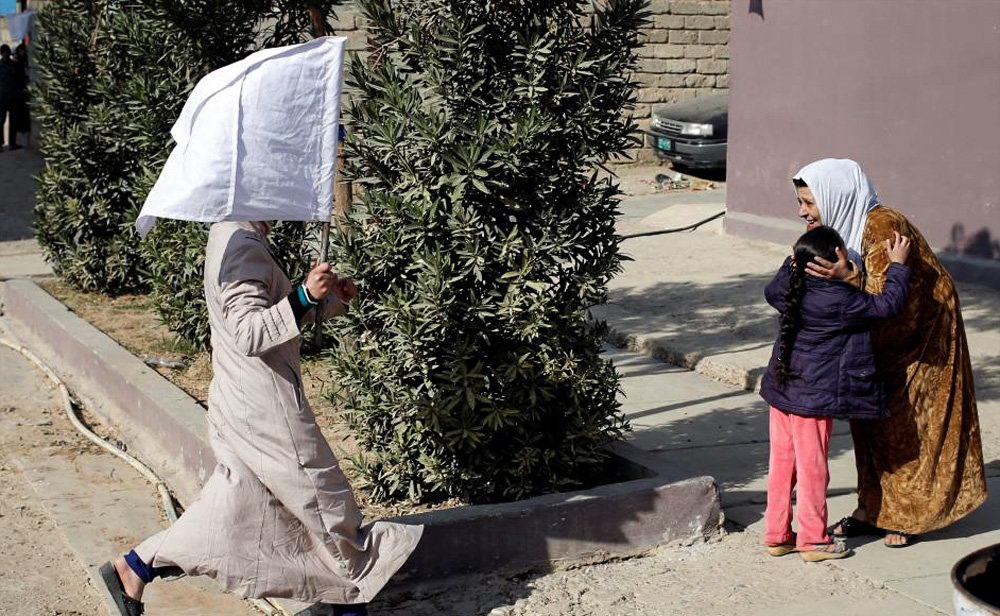 تصاویر : فرار از موصل با پرچم سفید