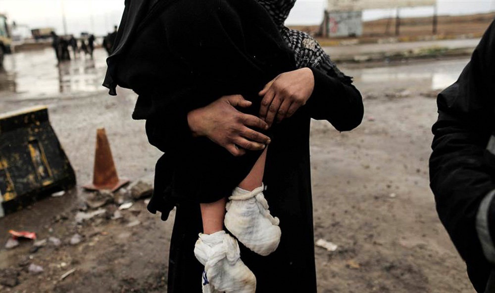 تصاویر : فرار ۵۰ هزار عراقی از موصل‎