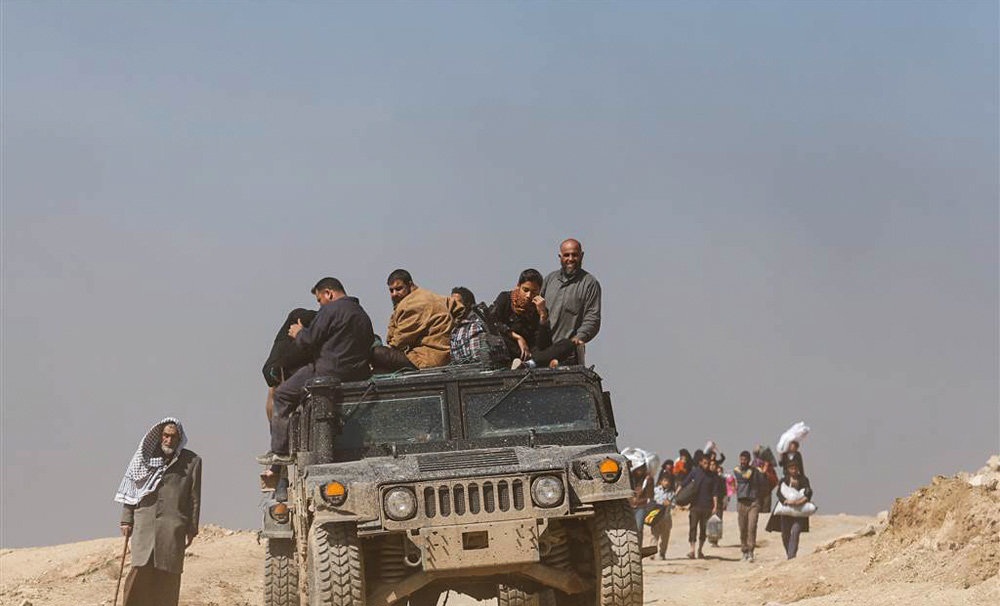 تصاویر : فرار ۵۰ هزار عراقی از موصل‎