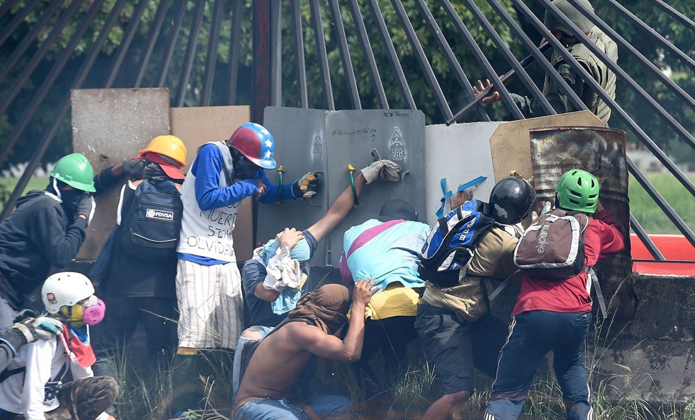 تصاویر : ادامه اعتراضات در کاراکاس‎