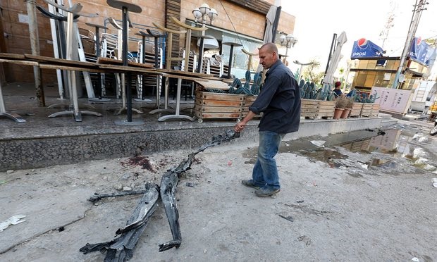 تصاویر : انفجار بستنی‌فروشی در بغداد با ۲۰ کشته