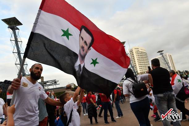 عکس بشار اسد در دیدار استرالیا و سوریه در سیدنی