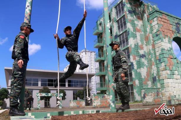 تصاویر : تمرین نیروهای پلیس چین به سبک قویترین مردان