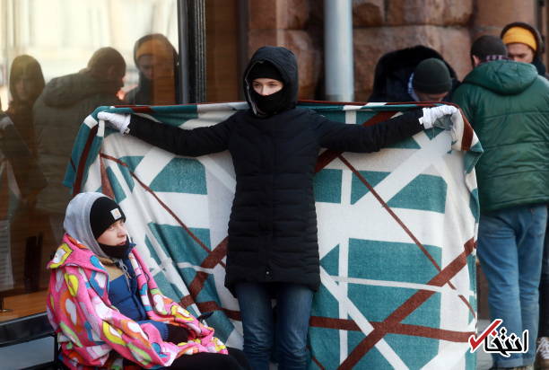 تصاویر : مشتاقان خرید آیفون ایکس در سرمای مسکو یخ زدند تصاویر : مشتاقان خرید آیفون ایکس در سرمای مسکو یخ زدند