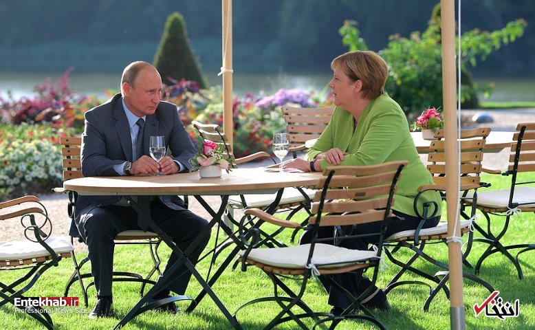 عکس/ مذاکره مرکل و پوتین در یک باغچه