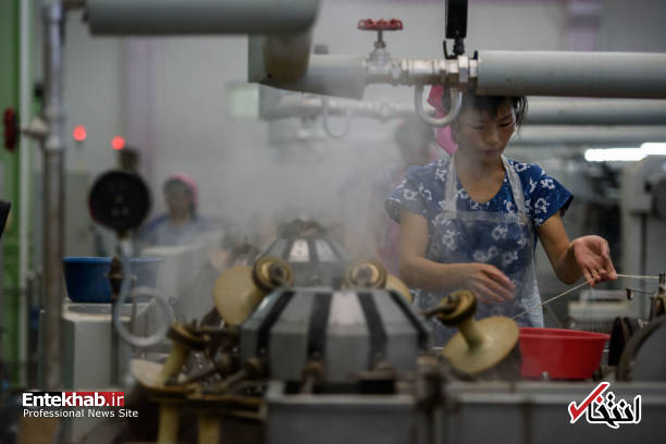 عکس/ زنان شاغل در کارخانه نساجی در کره شمالی