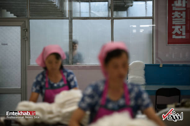 عکس/ زنان شاغل در کارخانه نساجی در کره شمالی