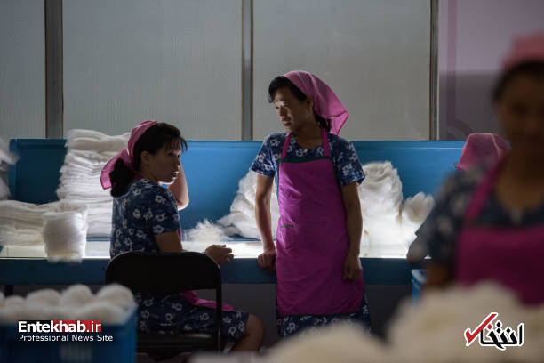 عکس/ زنان شاغل در کارخانه نساجی در کره شمالی