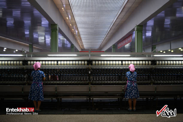 عکس/ زنان شاغل در کارخانه نساجی در کره شمالی