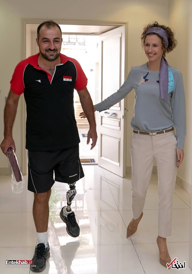 عکس/ استقبال اسماء اسد از یک جانباز