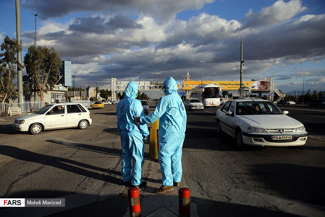 تصاویر: اجرای طرح تب سنجی در عوارضی اتوبان قم _تهران