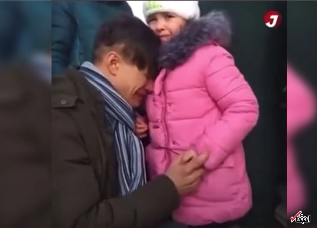تصاویر دردناک خداحافظی یک پدر اوکراینی با فرزندش