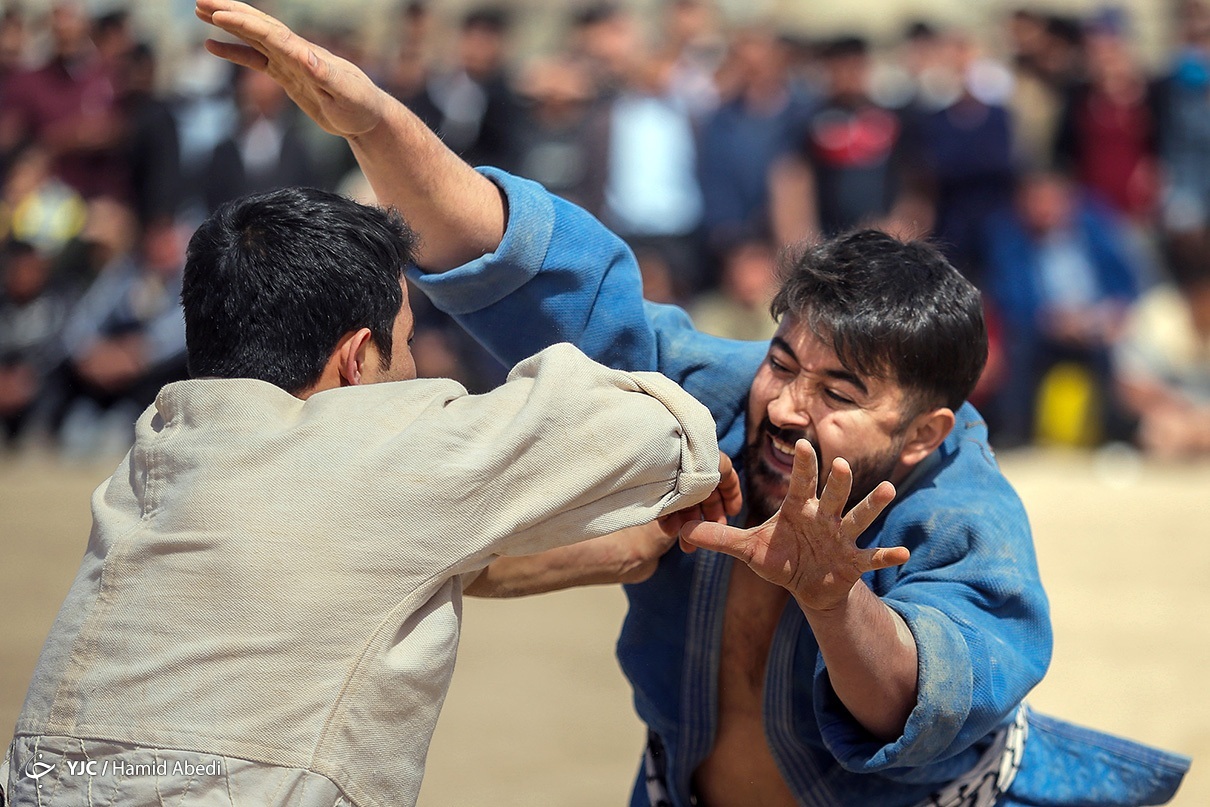 تصاویر: مسابقات نوروزی کشتی سنتی افغانستانی های مقیم قم