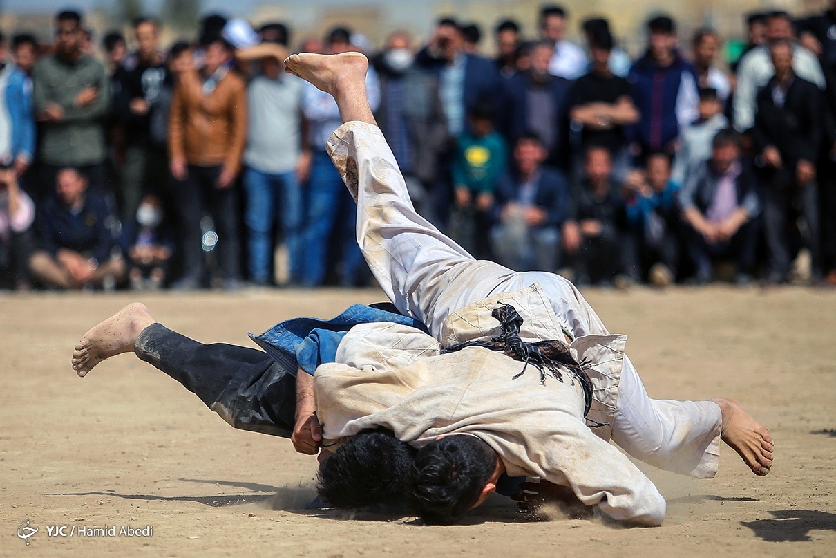 تصاویر: مسابقات نوروزی کشتی سنتی افغانستانی های مقیم قم