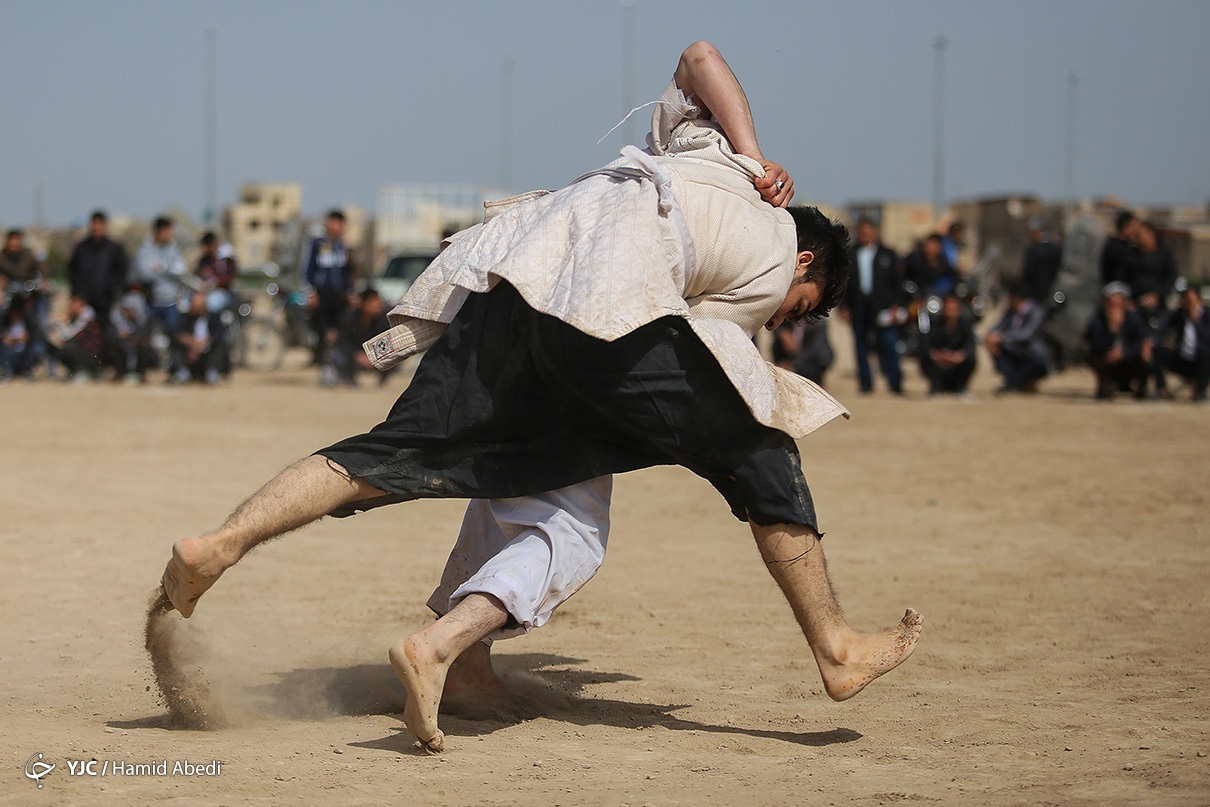 تصاویر: مسابقات نوروزی کشتی سنتی افغانستانی های مقیم قم