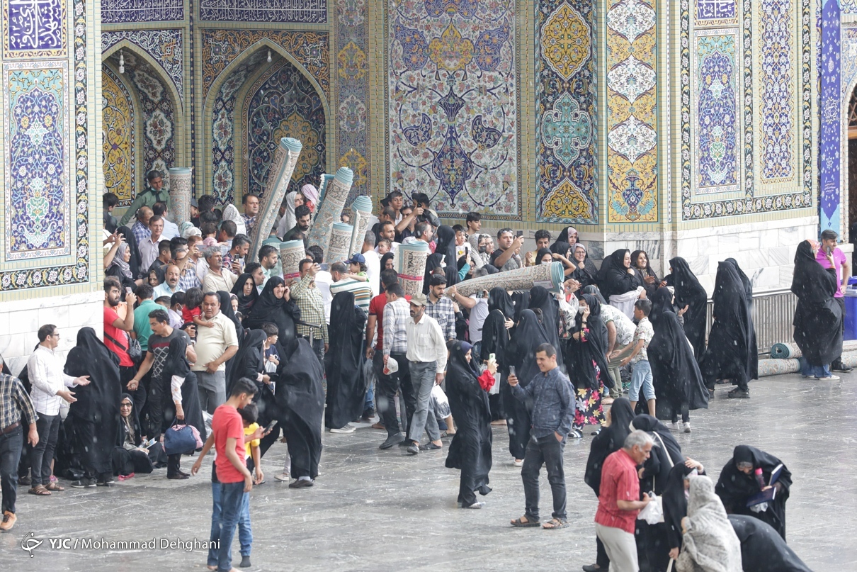 تصاویر: باران رحمت در شب میلاد امام رضا (ع)