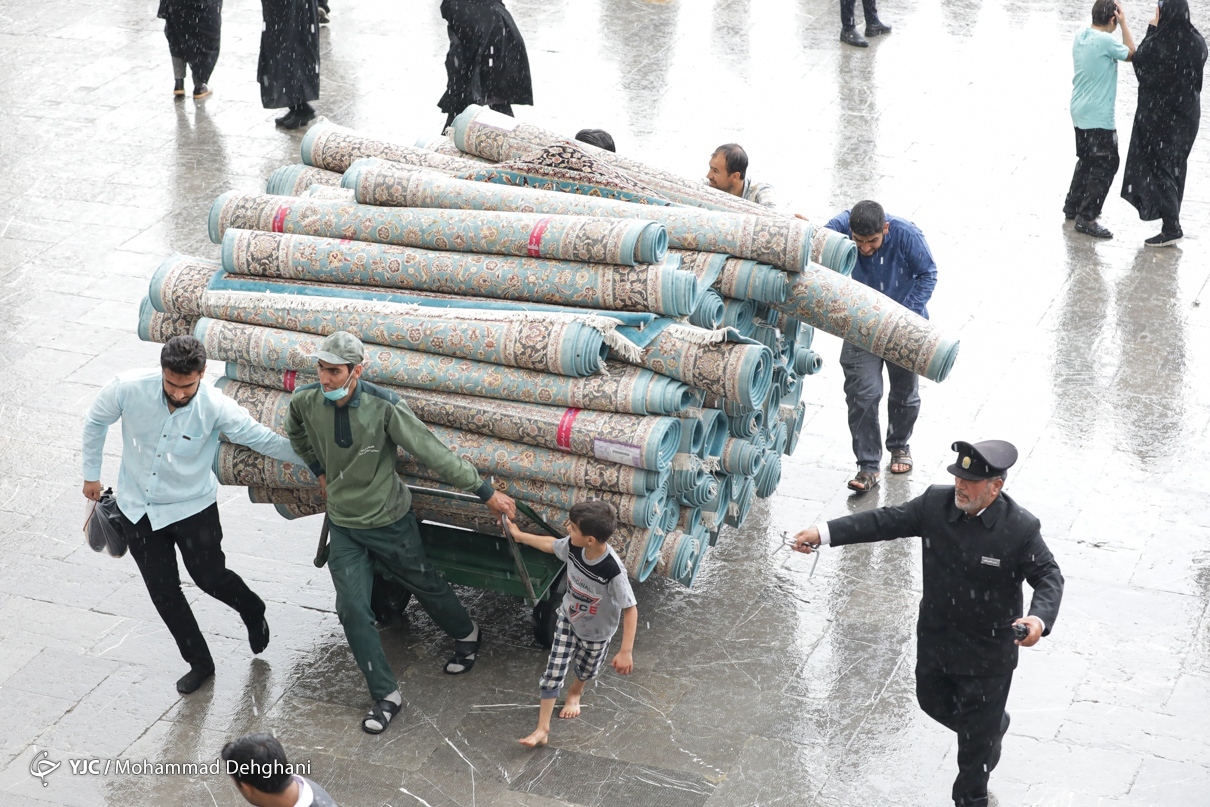 تصاویر: باران رحمت در شب میلاد امام رضا (ع)