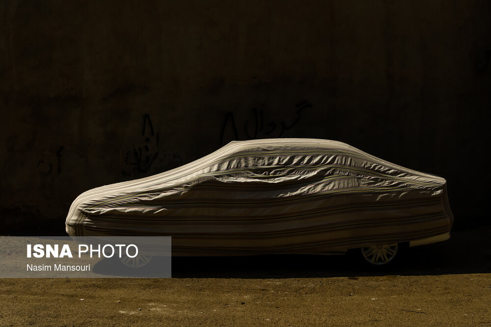 تصاویر: روپوش خودروها در گرمای خوزستان