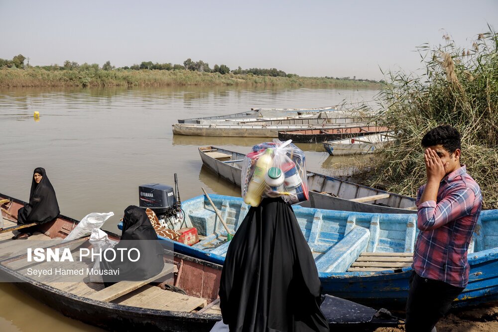 تصاویر: گذر سخت از رودخانه