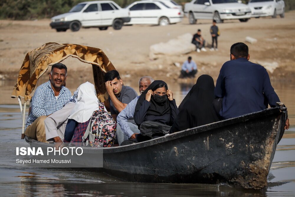 تصاویر: گذر سخت از رودخانه