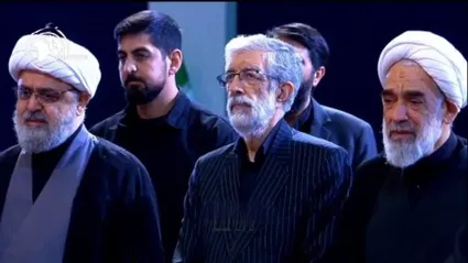 ببینید / ادای احترام حدادعادل و جمعی از مقامات کشوری بر پیکر رهبر شهید